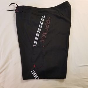 SOLD---Pelagic Black With Red Trim Board Shorts Size 36